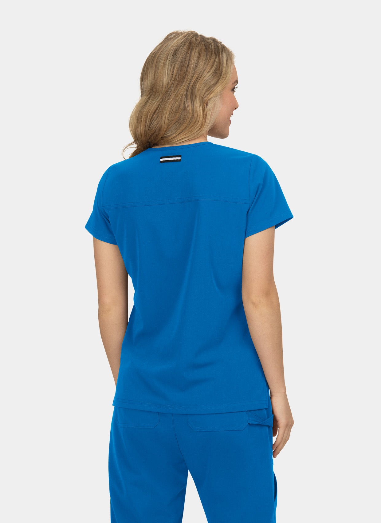 Blouse médicale femme Koi Next Gen Agitation et passion bleu roi dos